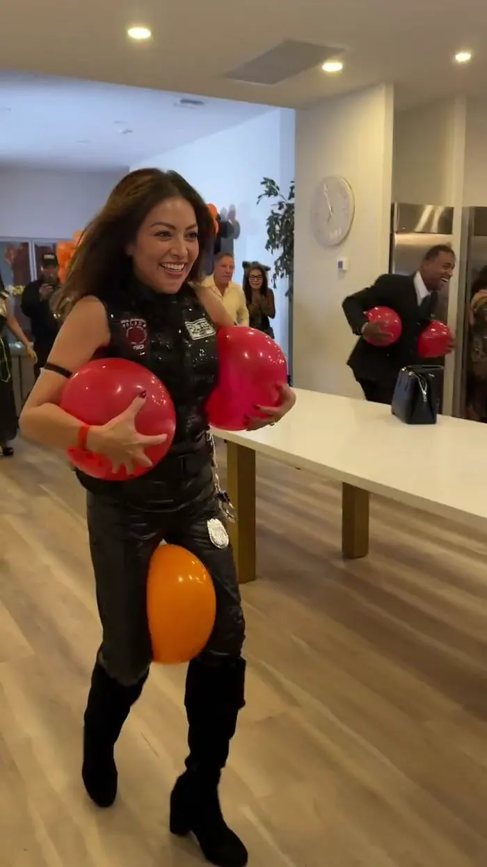 Guests in costume playing games at the mixer
